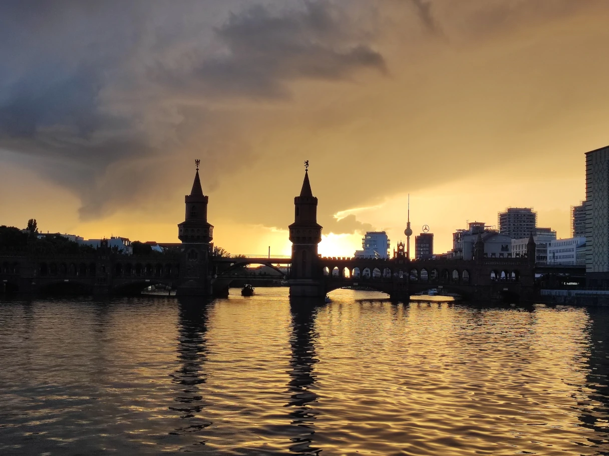 Kaiser Friedrich evening cruise, Berlin, Oberbaumbrücke, sunset, silhouettes of Oberbaumbrücke, television tower, Berlin from the water