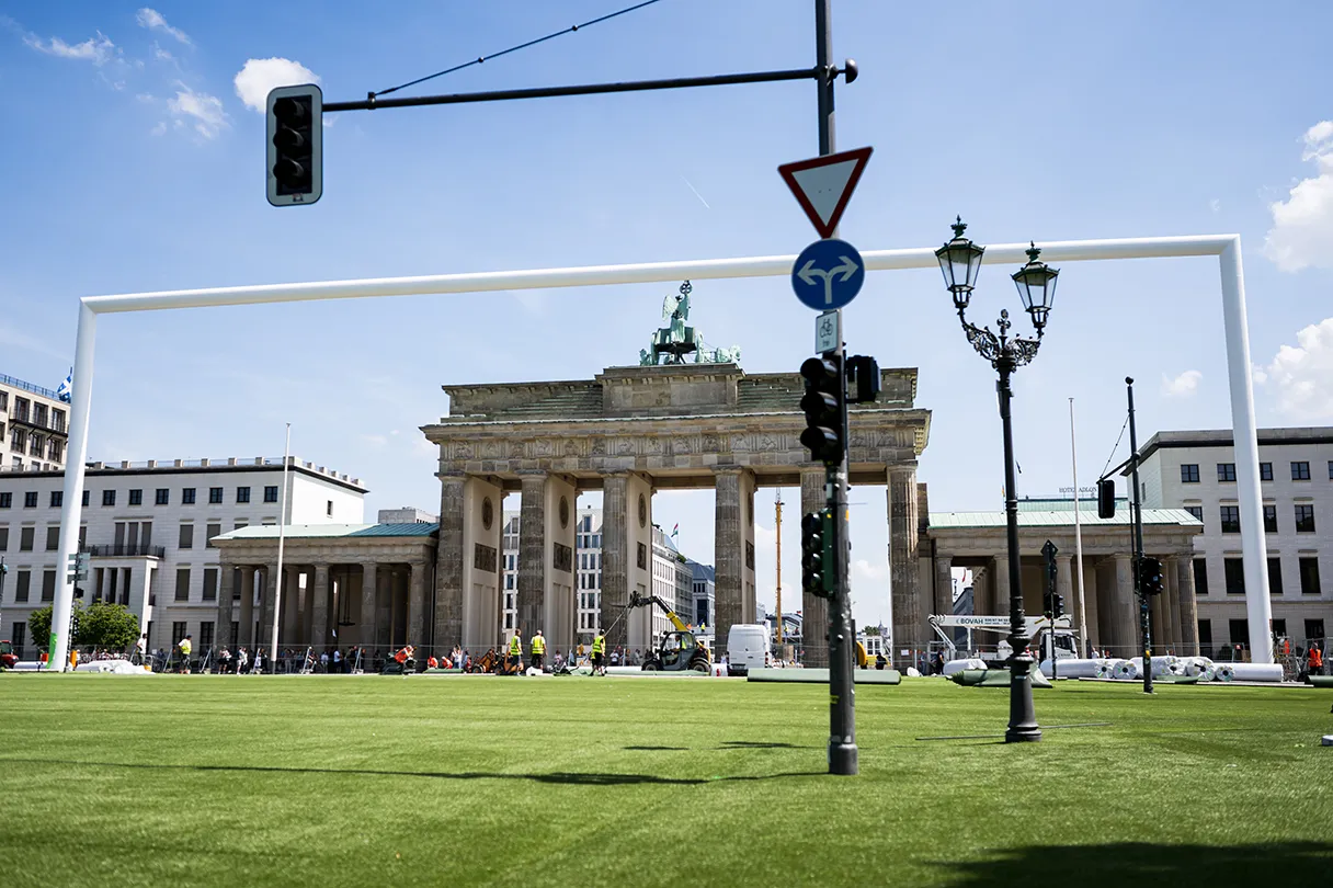 Brandenburg Gate, European Football Championship 2024, green turf on the street, TV tower in the background