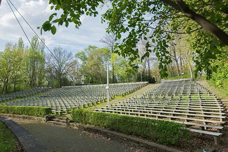 Weißensee open-air stage, empty rows of chairs, amphitheater