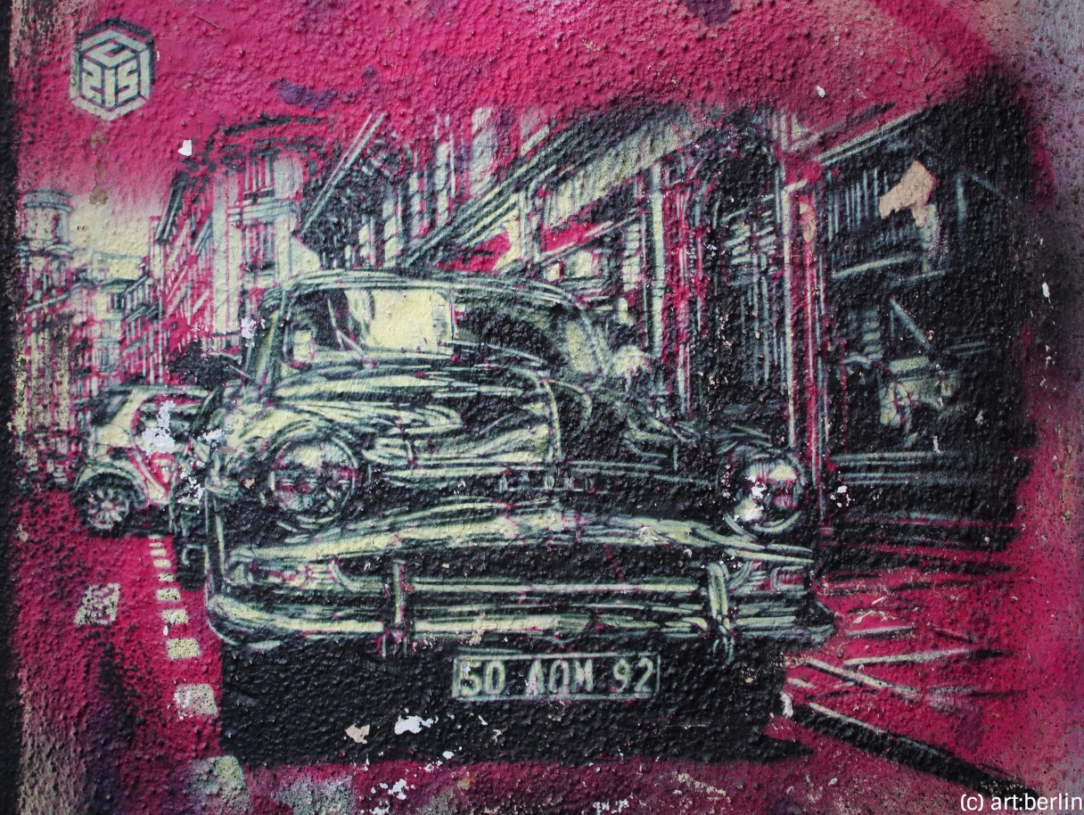 Street art, Berlin, a car is sprayed on a house wall