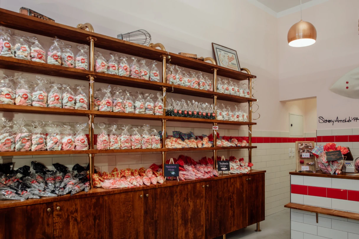 Aseli Manufaktur, Berlin, view into the sales room, full shelves with bags of white marshmallow mices