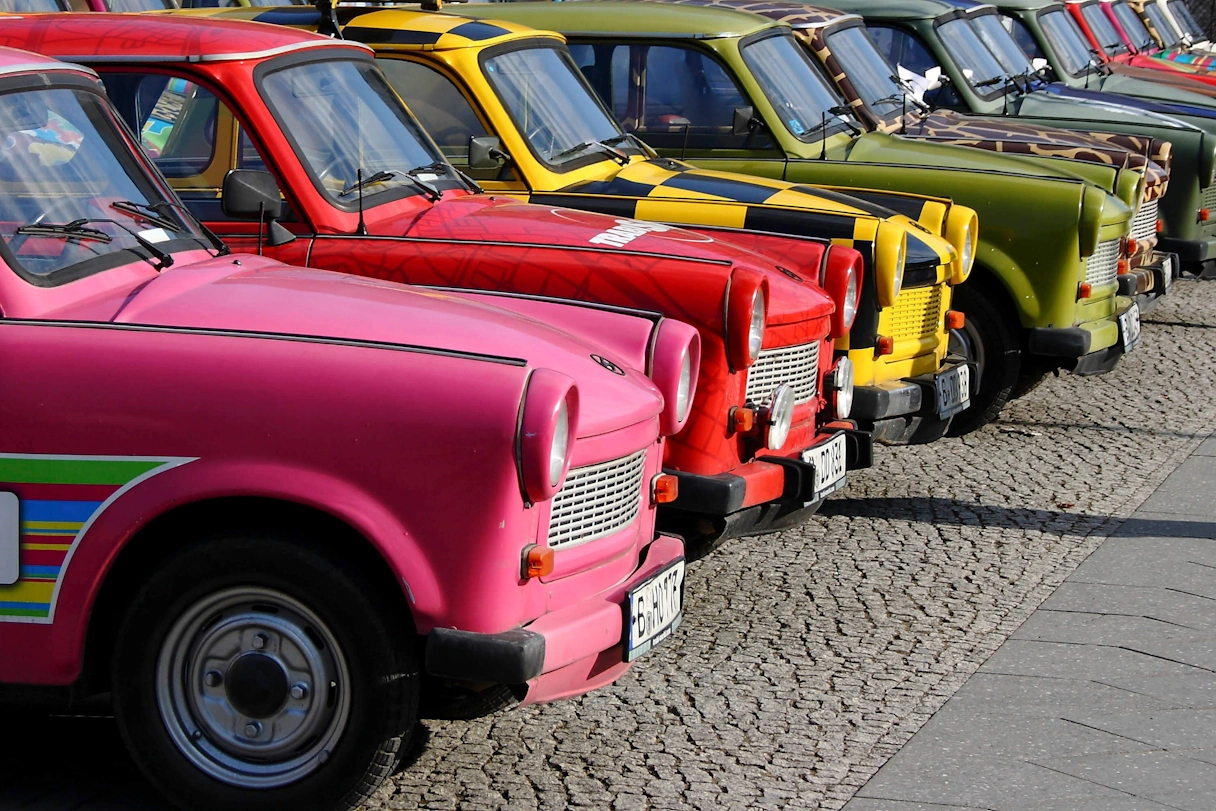 A row of colorful Trabants in Berlin