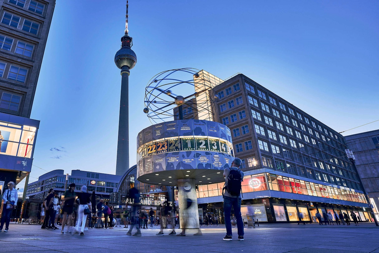 Alexanderplatz in Berlin. You can see the world clock, stores and the television tower