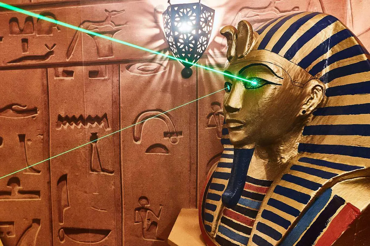 Sphinx pyramid, green lasers shine from the eyes, various hyroglyphs are painted on the wall