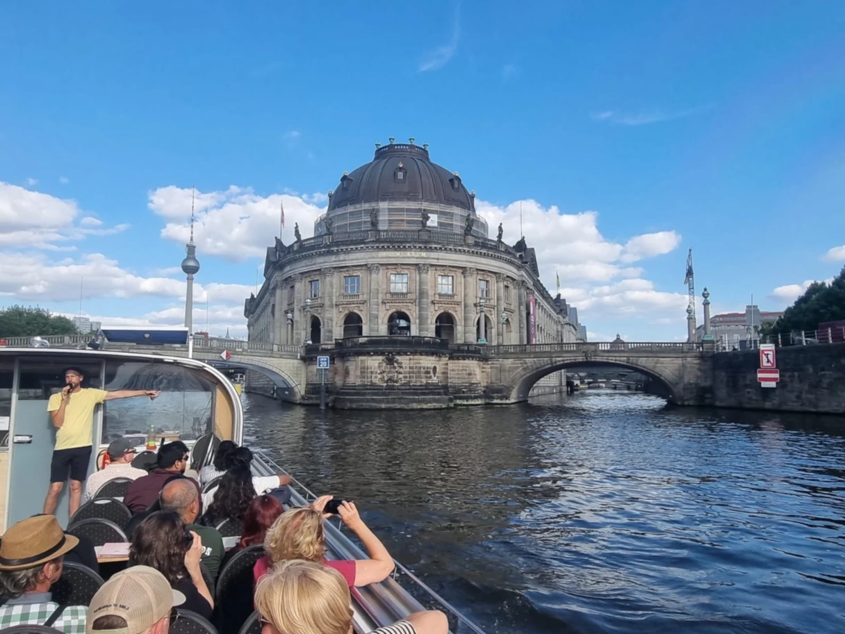 Reederei Hadynski, Berlin, view of the Museum Island with the Bode Museum, boat with tourists on the left wheel taking photographs