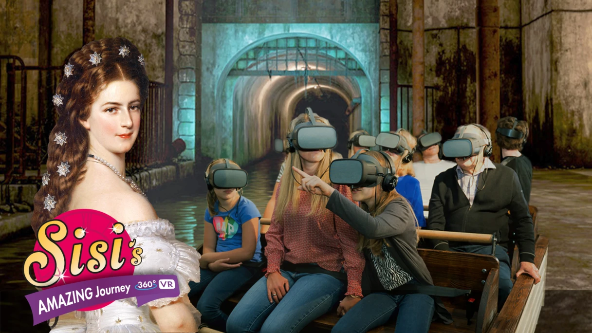 Sisi Amazing Journey, Besucher haben VR Brille auf und schauen einen Film, Logo links in der Ecke
