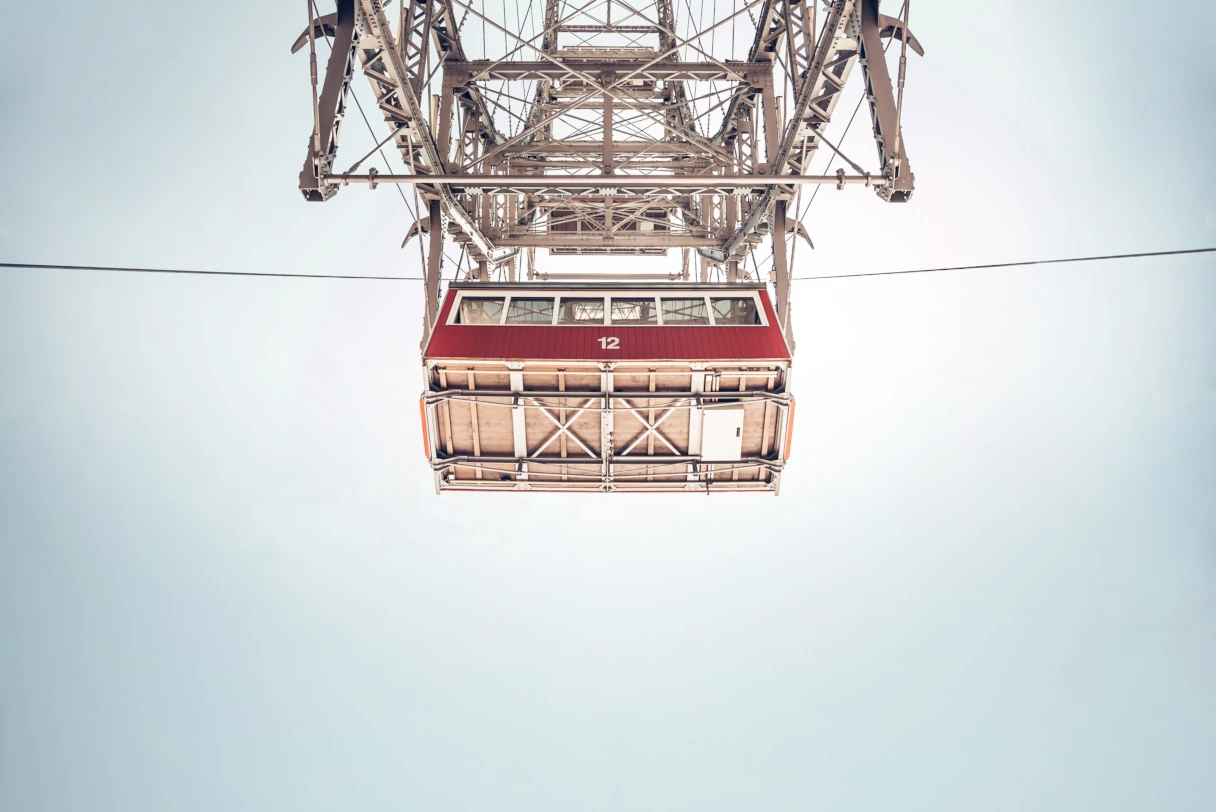A view of a gondola on the Vienna Giant Ferris Wheel from the outside. The view is from the bottom looking up.